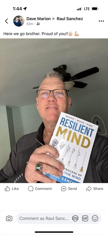 Reader 1 with their copy of RESILIENT MIND